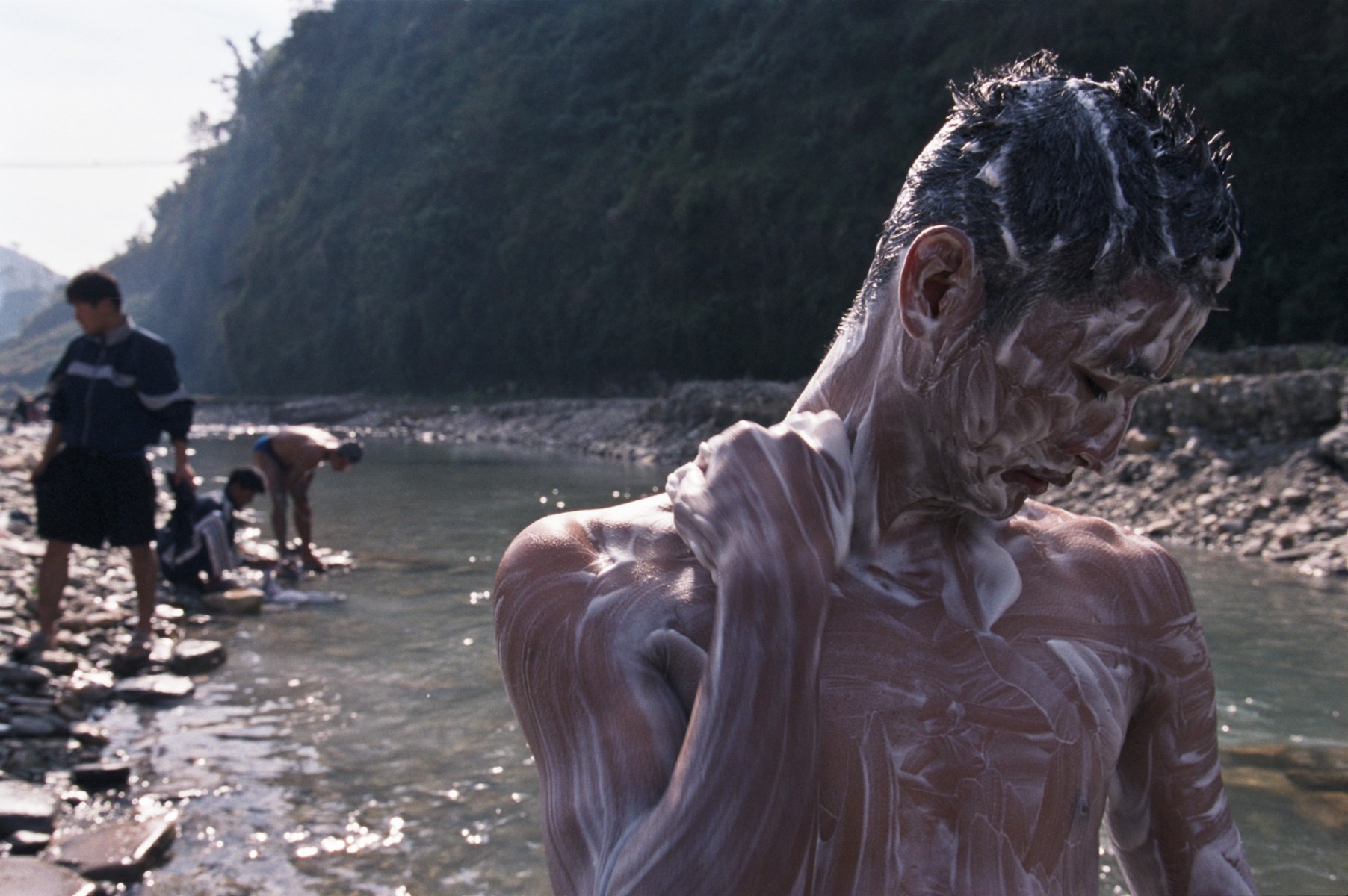 Washing in river, Pokara, Nepal